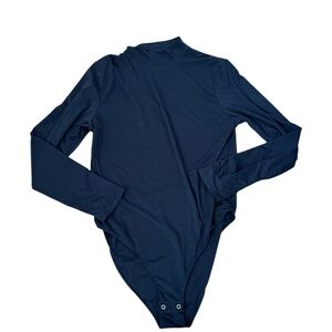 NWT ReoRia black long sleeve body suit. Size 2XL.